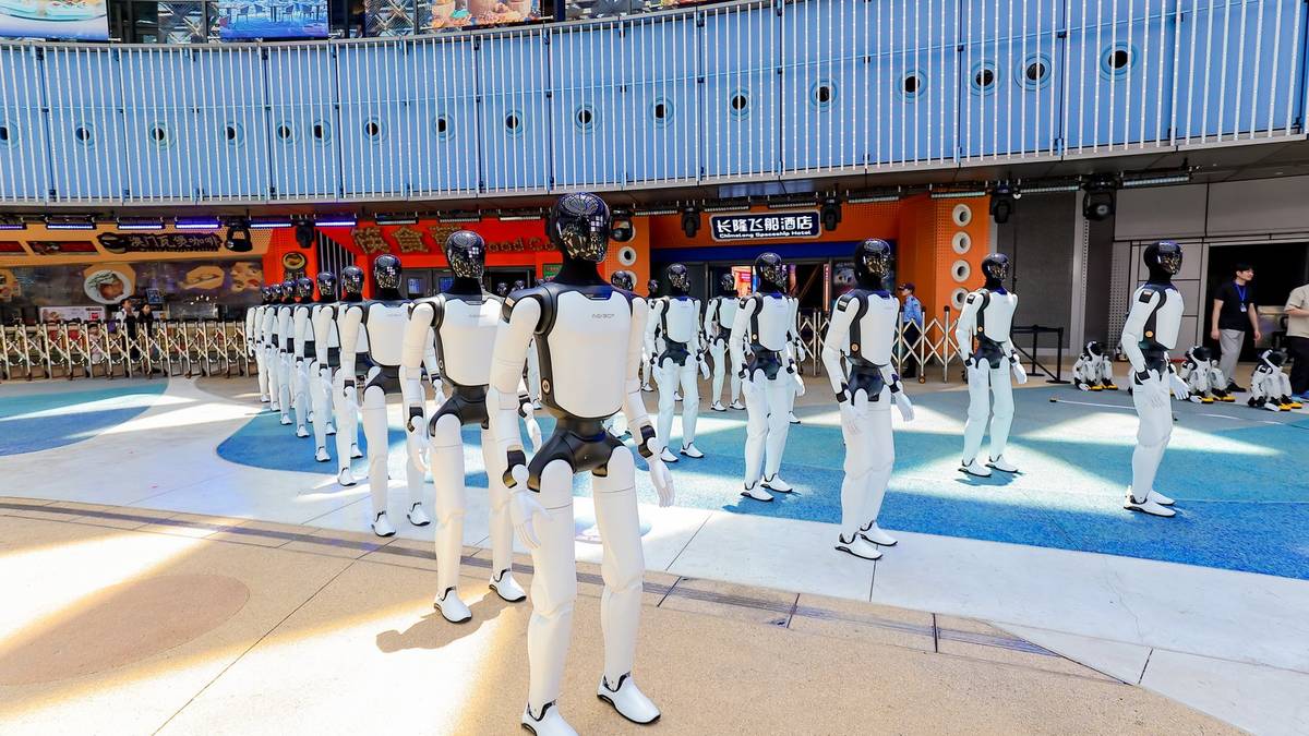 AgiBot humanoid robots lined up at Chimelong theme park