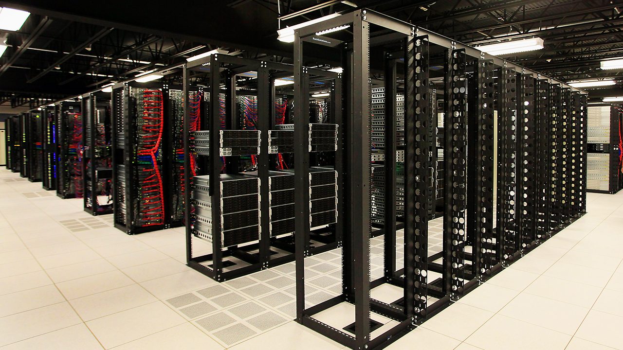 Server racks inside a US data center driving AI infrastructure investment