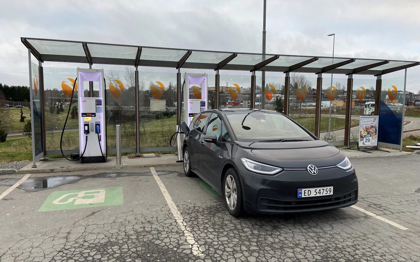 Electric car charging at a fast charging station in Norway
